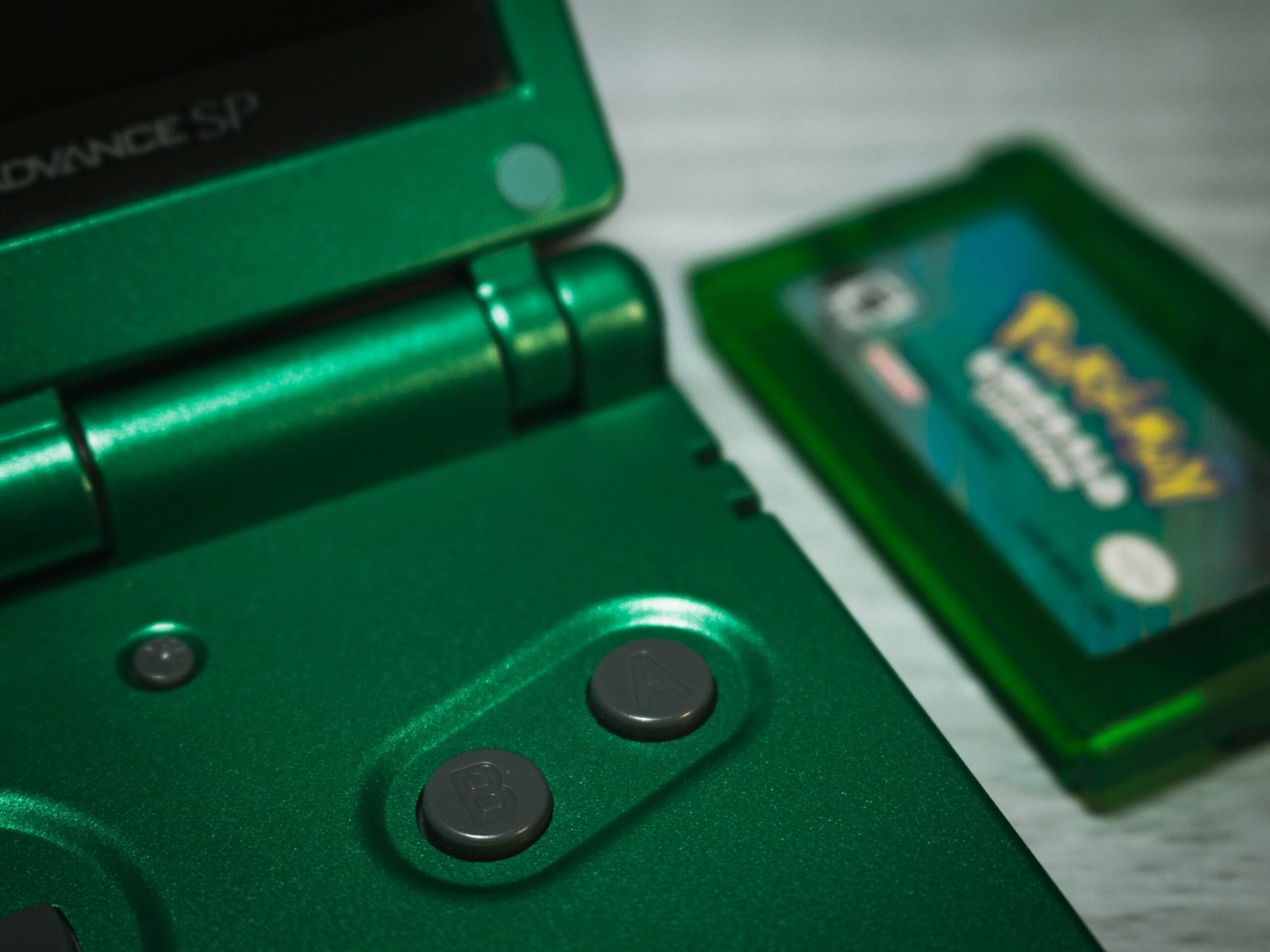 a close up of a green game controller
